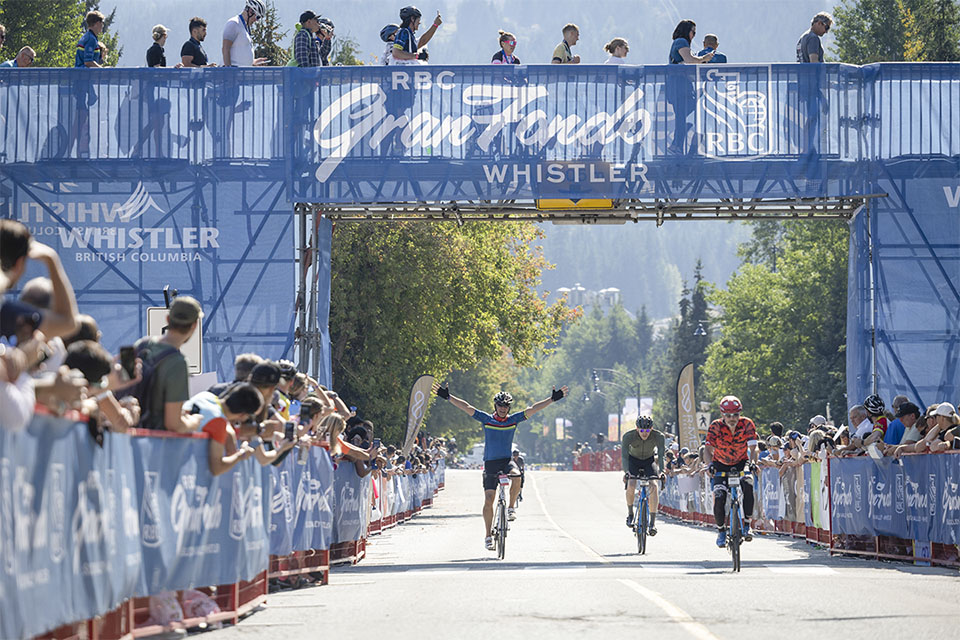 Cyclists crossing a finish line