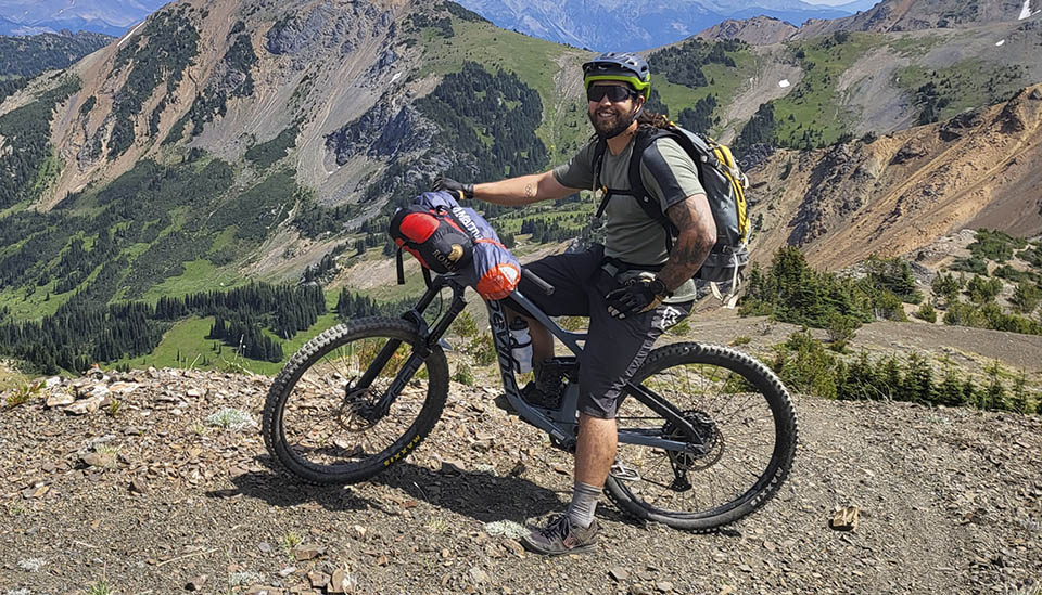 Chris riding a mountain bike